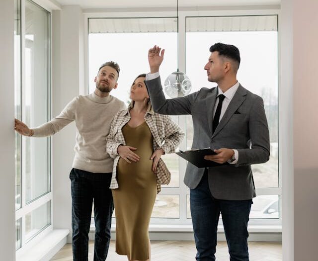 Lake Forest real estate broker shows house to couple