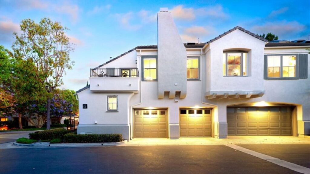real estate companies in aliso viejo listing of townhouse for sale showing garage