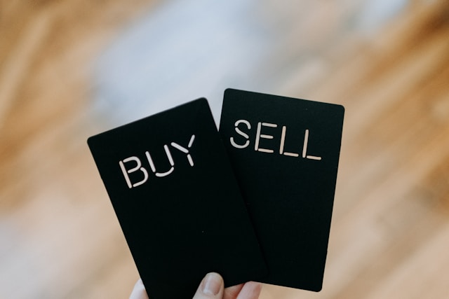 black cards with buy sell printed in white