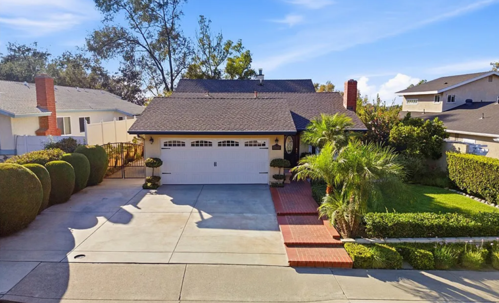 front of home listed for sale with Mission Viejo real estate company